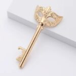 Deschizator de sticle decorativ tip masca, finisaj auriu - imagine 3